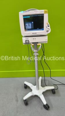 Philips IntelliVue MP30 Patient Monitor on Stand (Powers Up) with 1 x Philips IntelliVue X2 Handheld Patient Monitor Including ECG, SpO2, NBP, Press and Temp Options, 1 x Philips M3012A Module and 1 x Philips M1013A Gas Module (Powers Up)