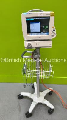 Philips IntelliVue MP30 Patient Monitor on Stand (Powers Up) with 1 x Philips IntelliVue X2 Handheld Patient Monitor (No Power) Including ECG, SpO2, NBP, Press and Temp Options, 1 x Philips M3012A Module and 1 x Philips M1013A Gas Module (Powers Up)