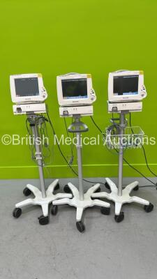 3 x Philips IntelliVue MP30 Patient Monitors on Stands with 3 x Philips M1013A Gas Modules (All Power Up)