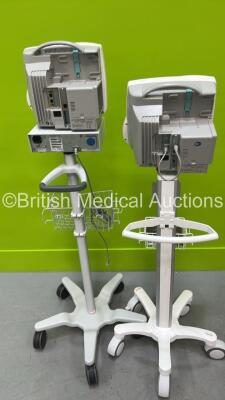 2 x Philips IntelliVue MP50 Patient Monitors on Stands with 1 x Philips M1013A Gas Module (Both Power Up) - 4