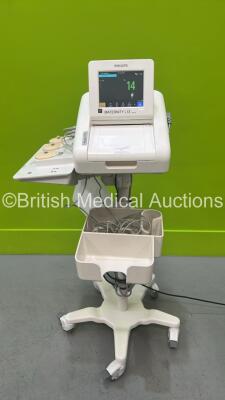 Philips FM30 Fetal Monitor on Stand *Mfd 2019* with SPO2 , 1 x US Transducer, 1 x Toco+MP Transducer and 1 x Philips Avalon CL Cableless Fetal Monitoring System with 1 x US Wireless Transducer and 2 x Toco+MP Transducers (Both Power Up) *DE65933009*