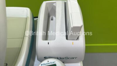 Verathon BVI 9400 Bladder Scanner Part No 0570-0190 with Transducer, 2 x Batteries and Charger on Table (Powers Up) *S/N B4307590* - 3