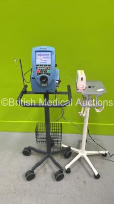 1 x Welch Allyn Solarc Light 49501 Light Source on Mobile Stand and 1 x Gambro Aquadex FlexFlow on Mobile Stand (Both Power Up) *2160 / na*