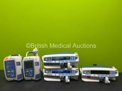 Job Lot Including 2 x CareFusion Alaris VP Plus Guardrails Infusion Pumps, 2 x CareFusion Alaris Guardrails Plus CC Syringe Pumps (Both Power Up) and 1 x CareFusion Alaris CC Syringe Pump *SN 135220409 / 135196930 / 370000193 / 800310355 / 370000086*