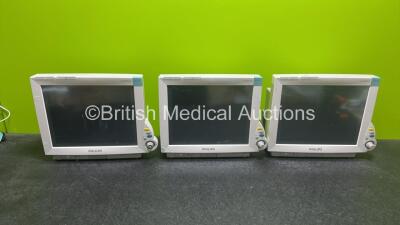 3 x Philips IntelliVue MP70 Patient Monitors (All Power Up - 1 x Missing Dial, Some Damage - See Photos)