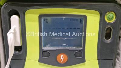 2 x Zoll AEDPro Defibrillators (Both Power Up, 1 x Cracked Screen - See Photo) in Carry Cases with 2 x 3 Lead ECG Leads, 3 x Li-ion Batteries, 3 x Electrodes (1 x Expired) and 2 x Skintact ECG Electrodes *Both Expiry Date 2025* - 3