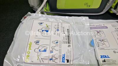 2 x Zoll AEDPro Defibrillators (Both Power Up, 1 x Cracked Screen - See Photo) in Carry Cases with 2 x 3 Lead ECG Leads, 3 x Li-ion Batteries, 3 x Electrodes (1 x Expired) and 2 x Skintact ECG Electrodes *Both Expiry Date 2025* - 5