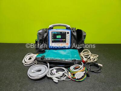 Zoll X Series Monitor/Defibrillator Application Version 02.34.05.00 (Powers Up, Missing Inserts On Handle - See Photo) in Case Including ECG, SPO2, NIBP, CO2 and Printer Options with 2 x Sure Power II Li-Ion Batteries ,1 x Ref 8300-0803-12 4 Lead ECG Lead