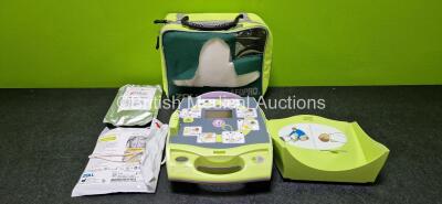 Zoll AED Plus Defibrillator (Powers Up) in Carry Case with 1 x Electrode *Expired* and 1 x iPAD AED Starter Kit *SN X03D14158*