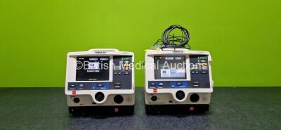 Job Lot Including 2 x Physio Control Lifepak 20e Defibrillator / Monitors (Both Power Up, Both Damaged Cases and Both Missing Cases - See Photos) Including ECG and Printer Options with 2 x Li-ion Batteries, 1 x Paddle Lead and 1 x 3 Lead ECG Lead and 2 x 