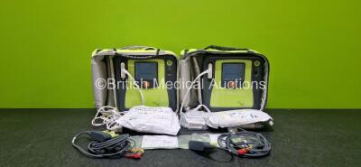 2 x Zoll AEDPro Defibrillators (Both Power Up, 1 x Cracked Screen - See Photo) in Carry Cases with 2 x 3 Lead ECG Leads, 2 x Li-ion Batteries and 2 x Electrodes *Both Expired*