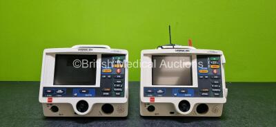 Job Lot Including 2 x Physio Control Lifepak 20e Defibrillator / Monitors (Both No Power, 1 x Damaged Handle and Both Missing Cases - See Photos) Including Pacer, ECG and Printer Options with 2 x Li-ion Batteries and 1 x Paddle Lead *SN 41692538 / 4530242