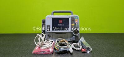 Physio-Control Lifepak 15 Monitor / Defibrillator *Mfd 2010* Ref 99577-000025, P/N - V15-2-000030 Including Auxiliary, Pacer, SpO2, CO2, NIBP, ECG and Printer Options (Powers Up Intermittently and Damaged Case - See Photos) with 1 x 4 Lead ECG Lead, 1 x T