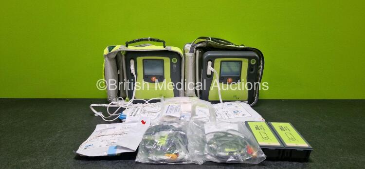 2 x Zoll AEDPro Defibrillators (Both Power Up) in Carry Cases with 2 x 3 Lead ECG Leads, 4 x Li-ion Batteries and 3 x Electrodes *All in Date*