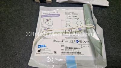 2 x Zoll AEDPro Defibrillators (Both Power Up) in Carry Cases with 2 x 3 Lead ECG Leads, 4 x Li-ion Batteries and 3 x Electrodes *All in Date* - 9