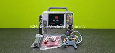 Physio-Control Lifepak 15 Monitor / Defibrillator *Mfd 2010* Ref 99577-000656, P/N - V15-2-001003 Including Auxiliary, Pacer, SpO2, CO2, NIBP, ECG and Printer Options (Powers Up Intermittently and Damaged Case - See Photos) with 1 x 4 Lead ECG Lead, 1 x T