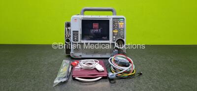 Physio-Control Lifepak 15 Monitor / Defibrillator *Mfd 2009* Ref 99577-000025, P/N - V15-2-000030 Including Auxiliary, Pacer, SpO2, CO2, NIBP, ECG and Printer Options (Powers Up Intermittently and Damaged Case - See Photos) with 1 x 4 Lead ECG Lead, 1 x T