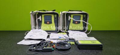 2 x Zoll AEDPro Defibrillators (Both Power Up, 1 x Cracked Screen - See Photo) in Carry Cases with 2 x 3 Lead ECG Leads, 4 x Li-ion Batteries and 3 x Electrodes *2 x Expired*