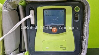 2 x Zoll AEDPro Defibrillators (Both Power Up, 1 x Cracked Screen - See Photo) in Carry Cases with 2 x 3 Lead ECG Leads, 4 x Li-ion Batteries and 3 x Electrodes *2 x Expired* - 4