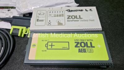 2 x Zoll AEDPro Defibrillators (Both Power Up, 1 x Cracked Screen - See Photo) in Carry Cases with 2 x 3 Lead ECG Leads, 4 x Li-ion Batteries and 3 x Electrodes *2 x Expired* - 6