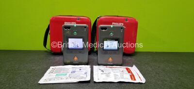 2 x Philips Heartstart FR3 Defibrillator (Both Power Up) in 2 x Carry Cases with 2 x LiMnO2 Batteries *Install Before - 2021 & 2027* and 2 x Electrodes *1 x Expired*