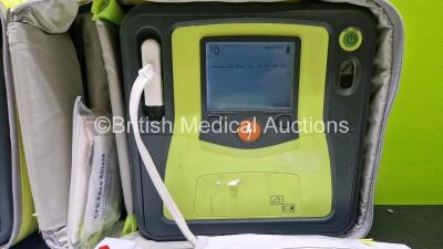 2 x Zoll AEDPro Defibrillators (Both Power Up) in Carry Cases with 1 x 3 Lead ECG Lead, 4 x Li-ion Batteries, 4 x Skintact ECG Electrodes *All in Date* and 3 x Electrodes - 4