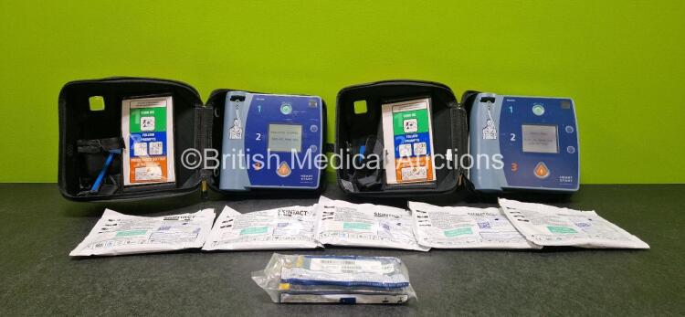 2 x Philips Heartstart FR2+ Defibrillators (Both Power Up) with 5 x Skintact Electrodes *All in Date* and 3 x M3863A LiMnO2 Batteries