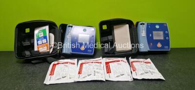 2 x Philips Heartstart FR2+ Defibrillators (Both Power Up) with 4 x Philips Electrodes *All Expired* and 2 x M3863A LiMnO2 Batteries