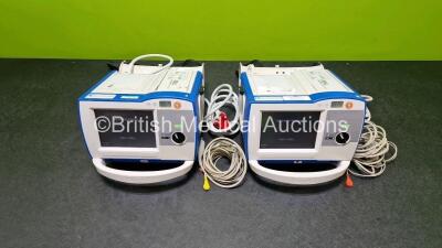 2 x Zoll R Series Plus Defibrillators / Monitors (Both Power Up) Including ECG and Printer Options with 2 x 3 Lead ECG Leads, 2 x Paddle Leads, 2 x Power Cords and 2 x Lithium Ion Rechargeable Batteries *SN AF13B027387 / AF12F023122* - 2