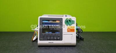 Philips Heartstart XL+ Defibrillator (Powers Up) Including ECG, Pacer and Printer Options with 1 x Paddle Lead with 1 x Philips M3725A Test Load, 1 x 3 Lead ECG Lead and 1 x Li-Ion Battery