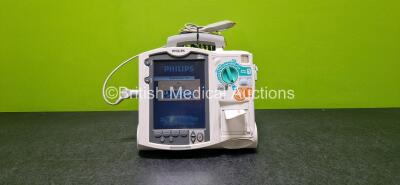 Philips Heartstart MRx Defibrillator (Powers Up) Including Pacer, ECG and Printer Options with 1 x Philips M3539A Module, 1 x Philips M3538A Li-Ion Battery, 1 x Paddle Lead with 1 x M3725A Test Load and 1 x 3 Lead ECG Lead (Damaged - See Photo)