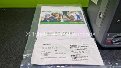 Philips Heartstart Intrepid Defibrillator *Mfd 06-2020* in Box (Powers Up) Including ECG and Printer Options with 1 x Paddle Lead, 1 x 3 Lead ECG Lead, 1 x Li-ion Rechargeable Battery, 1 x Power Cord, 8 x Philips Heartstart Pads *All Expired* and User Man - 7