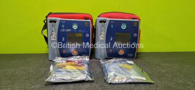 2 x Philips Heartstart FR2+ Defibrillators in Carry Cases (Both Untested Due to No Battery) with 2 x Philips Training Pads *SN 0108267564 / 0203082949*