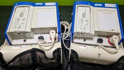 2 x Zoll R Series Plus Defibrillators / Monitors (Both Power Up) Including ECG and Printer Options with 2 x 3 Lead ECG Leads (Both Damaged Casings - See Photos), 2 x Paddle Leads, 2 x Power Cords and 2 x Lithium Ion Rechargeable Batteries *SN AF13B027395 - 7