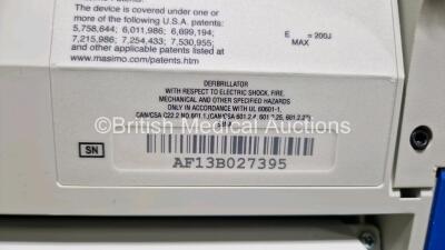 2 x Zoll R Series Plus Defibrillators / Monitors (Both Power Up) Including ECG and Printer Options with 2 x 3 Lead ECG Leads (Both Damaged Casings - See Photos), 2 x Paddle Leads, 2 x Power Cords and 2 x Lithium Ion Rechargeable Batteries *SN AF13B027395 - 11