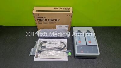 Job Lot Including 1 x Physio Control Ref 11141-000107 Mobile Li-ion Charger with 2 x Lithium Rechargeable Batteries (Powers Up and Damaged Case- See Photo) and 1 x Lifepak 15 Power Adapter Ref 11140-000074 *Like New in Box* - 2