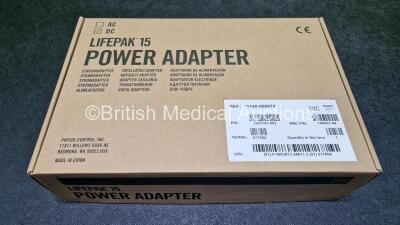 Job Lot Including 1 x Physio Control Ref 11141-000107 Mobile Li-ion Charger with 2 x Lithium Rechargeable Batteries (Powers Up and Damaged Case- See Photo) and 1 x Lifepak 15 Power Adapter Ref 11140-000074 *Like New in Box* - 13