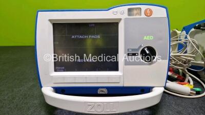 2 x Zoll R Series Plus Defibrillators / Monitors (Both Power Up) Including ECG and Printer Options with 2 x 3 Lead ECG Leads (Both Damaged Casings - See Photos), 2 x Paddle Leads, 2 x Power Cords and 2 x Lithium Ion Rechargeable Batteries *SN AF13B027383 - 3