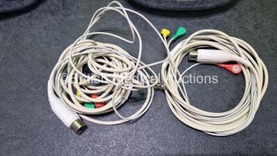 2 x Zoll R Series Plus Defibrillators / Monitors (Both Power Up) Including ECG and Printer Options with 2 x 3 Lead ECG Leads (Both Damaged Casings - See Photos), 2 x Paddle Leads, 2 x Power Cords and 2 x Lithium Ion Rechargeable Batteries *SN AF13B027383 - 7