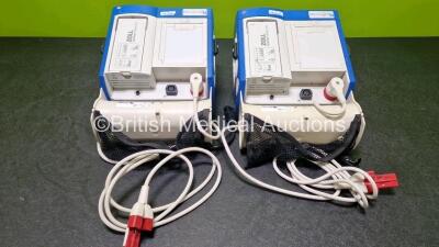 2 x Zoll R Series Plus Defibrillators / Monitors (Both Power Up) Including ECG and Printer Options with 2 x 3 Lead ECG Leads (Both Damaged Casings - See Photos), 2 x Paddle Leads, 2 x Power Cords and 2 x Lithium Ion Rechargeable Batteries *SN AF13B027383 - 10