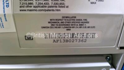 2 x Zoll R Series Plus Defibrillators / Monitors (Both Power Up) Including ECG and Printer Options with 2 x 3 Lead ECG Leads (Both Damaged Casings - See Photos), 2 x Paddle Leads, 2 x Power Cords and 2 x Lithium Ion Rechargeable Batteries *SN AF13B027383 - 13