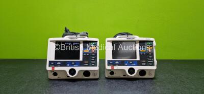 2 x Physio Control Lifepak 20e Defibrillators / Monitors (Both Power Up, Both Missing Casings and Both Damaged Casings - See Photos) Including Pacer, ECG and Printer Options with 2 x Li-ion Batteries and 2 x Paddle Leads *SN 39400609 / 39417424*