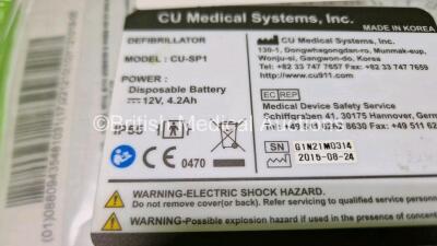 2 x CU Medical Systems Inc iPAD Intelligent Public Access Defibrillators (Both Power Up with Stock Battery - Stock Battery Not Included) with 1 x LiMnO2 Battery *Flat* and 2 x CU Medical Defibrillation Pads (Both Expired)*SN G1J45D0438 / G1N21M0314* - 8