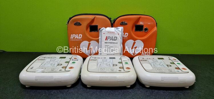 3 x CU Medical Systems Inc iPAD Intelligent Public Access Defibrillators in 2 x Carry Cases (All Power Up) with 1 x iPAD AED Starter Kit, 1 x LiMnO2 Battery and 2 x CU Medical Defibrillation Pads (Both Expired) *SN G1J43C148 / G1J45D0541 / G1M33R0121*