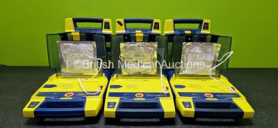 6 x Cardiac Science Powerheart AED G3 Automated External Defibrillators (All Power Up, 1 x Damaged Connector and 1 x Faulty Screen - See Photos) with 2 x LiSO2 Batteries and 5 x Electrodes *4 x Expired - 1 x Expiry Date 2025* *SN 4355000 / 4004321 / 36919