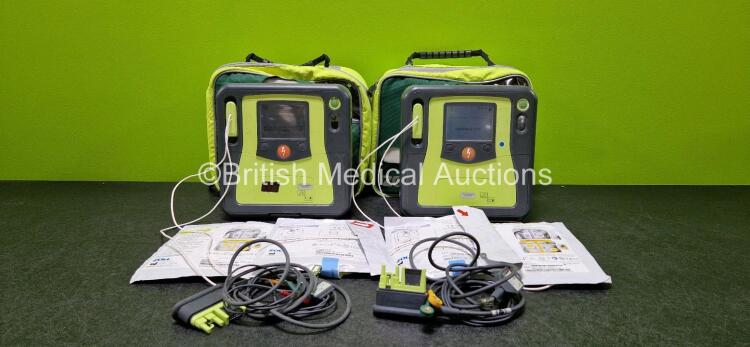 2 x Zoll AEDPro Defibrillators (Both Power Up) in Carry Cases with 2 x 3 Lead ECG Leads, 4 x Zoll Electrodes *2 x Expired* and 2 x LiMnO2 Batteries *SN AA14J033892 / AA09C013174*