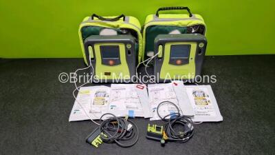 2 x Zoll AEDPro Defibrillators (Both Power Up) in Carry Cases with 2 x 3 Lead ECG Leads, 4 x Zoll Electrodes *2 x Expired* and 2 x LiMnO2 Batteries *SN AA14J033892 / AA09C013174* - 2