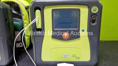 2 x Zoll AEDPro Defibrillators (Both Power Up) in Carry Cases with 2 x 3 Lead ECG Leads, 4 x Zoll Electrodes *2 x Expired* and 2 x LiMnO2 Batteries *SN AA14J033892 / AA09C013174* - 4