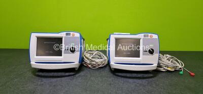 2 x Zoll R Series Plus Defibrillators / Monitors (Both Power Up) Including ECG and Printer Options with 2 x 3 Lead ECG Leads, 2 x Paddle Leads and 2 x Lithium Ion Rechargeable Batteries *SN AF13B027398 / AF13B027374*