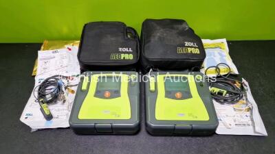 2 x Zoll AEDPro Defibrillators (Both Power Up) in Carry Cases with 2 x 3 Lead ECG Leads, 4 x Zoll Electrodes *3 x Expired*, 1 x Ambu BlueSensor P ECG Electrode *Expired* and 2 x LiMnO2 Batteries *SN AA14H033214 / AA14H033182* - 2